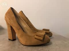 25$ brand new pair of heels with box