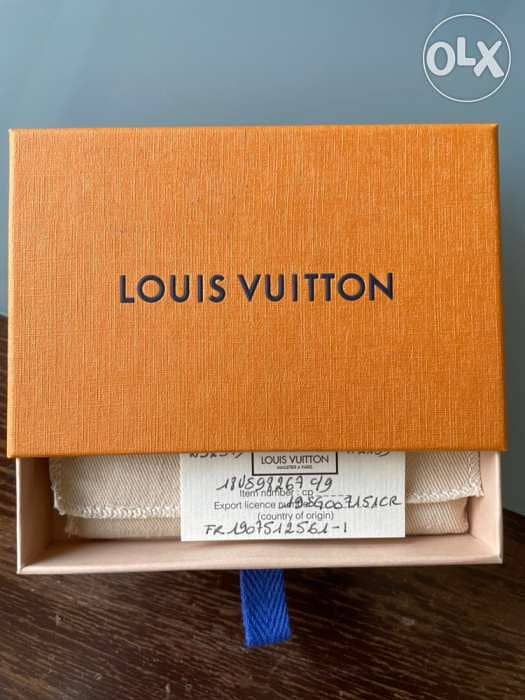 Louis Vuitton labeled ID Bracelet in original pouch and box