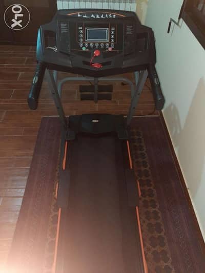 Treadmill barely used.