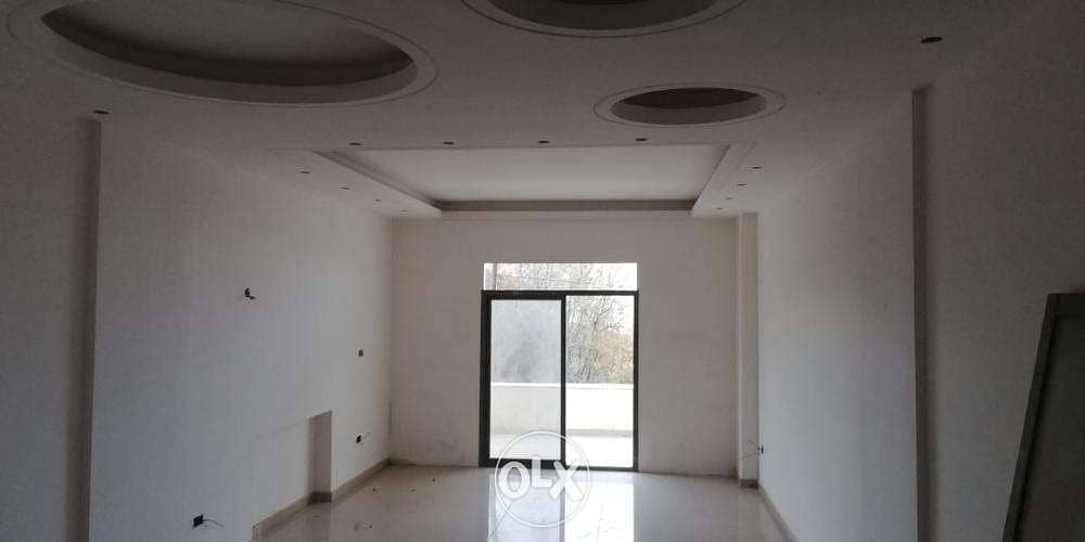 L08804-Apartment with A Large Terrace For Sale In Douar 0