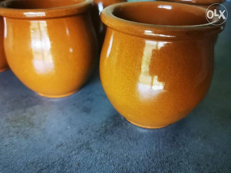 6 glazed clay cups 1