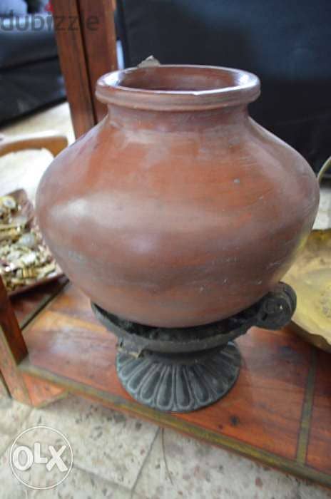 pottery jar with iron base 2