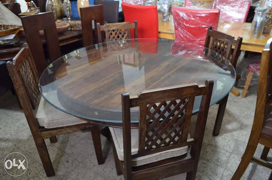round solid wood teak table with 4 chairs 1