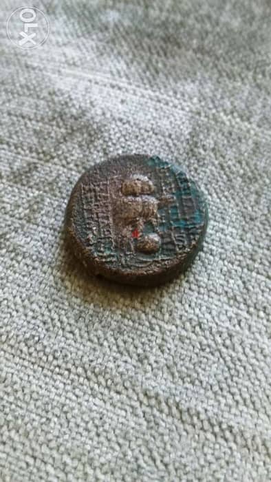 Greek Bronze Coin of Cleopetra Thea reign of Antiochus year 123 BC 1