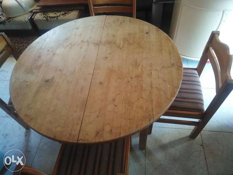 طاولة سفرة خشب زين شغل مرتب وثقيل مع ٦ كراسي 1