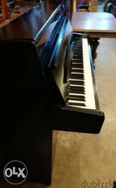 Piano linder like new 3 pedal tuning warranty