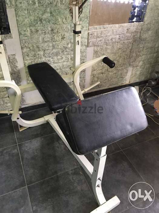 adjustable bench with cable and biceps and legs extention like new 3