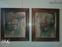 two old paintings on leaves signed size 34*39cm with the frame