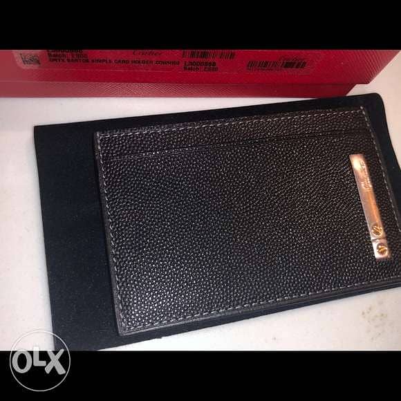 CARTIER (new in its gift bag) black genuine grained leather 6