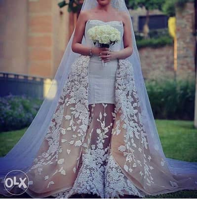 This swarovski wedding dress for sale b 1,500$