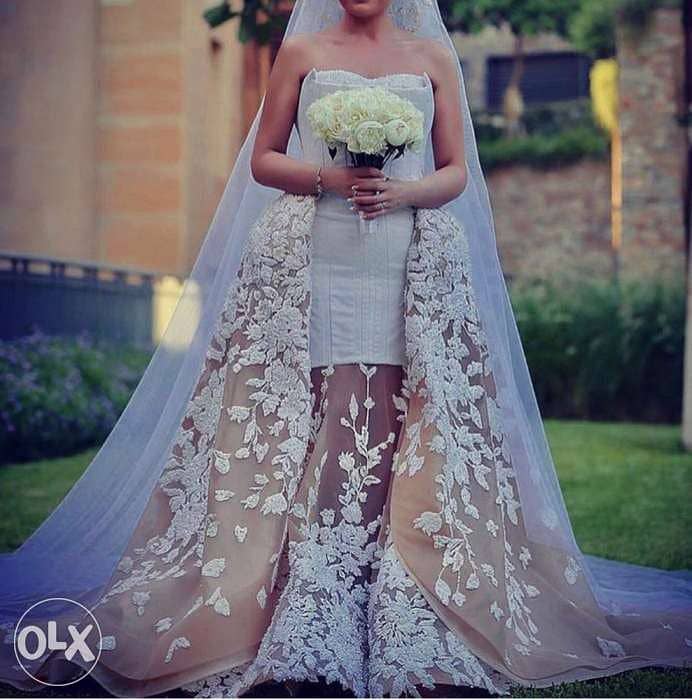 This swarovski wedding dress for sale b 1,500$ 0