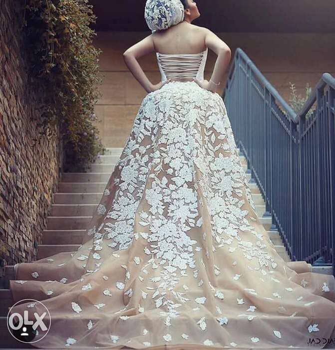 This swarovski wedding dress for sale b 1,500$ 1