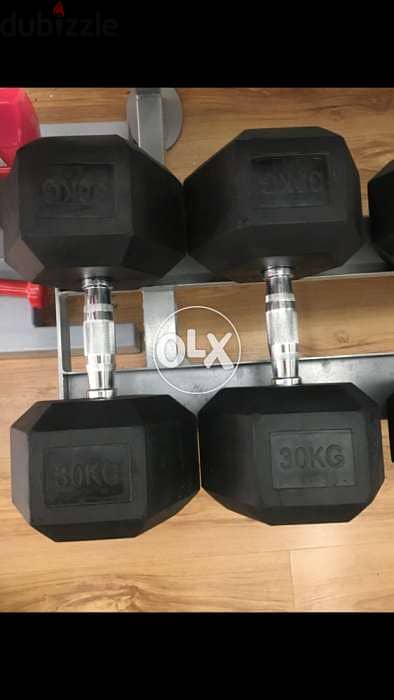 dumbels 60 kilo 30 kilo each like new