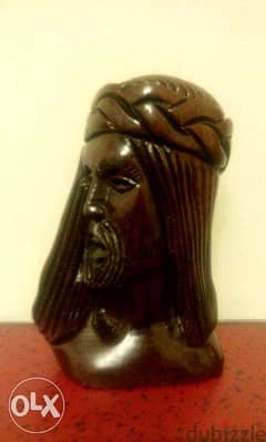 jesus head carved on wood 0