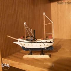 Miniature vintage wooden boat model