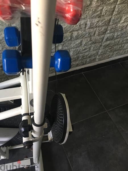 byke and elliptical with twister and dumbells like new 3