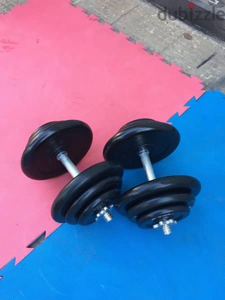 rubber dumbells 40 kilo like new we have also all sports equipment 1