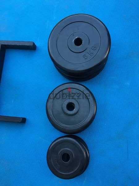 rubber dumbells 40 kilo like new we have also all sports equipment 3