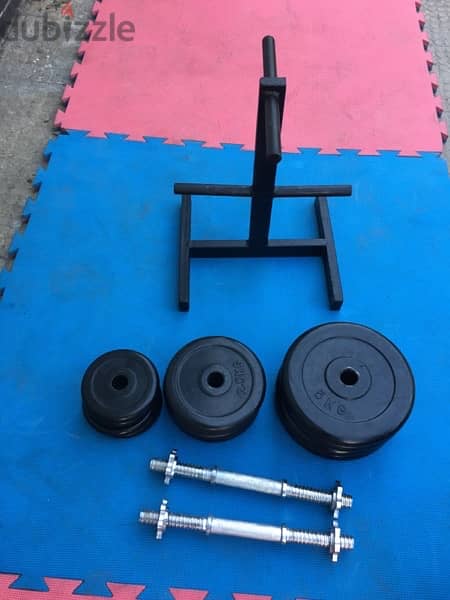 rubber dumbells 40 kilo like new we have also all sports equipment 4