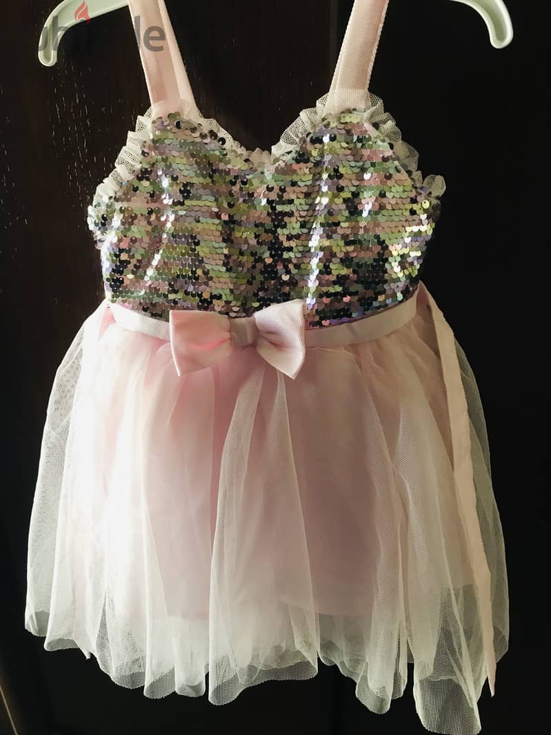 identical pink dress size 2 years and size 5-6 years 0