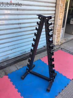 rack for dumbells like new we have also all sports equipment 70/443573