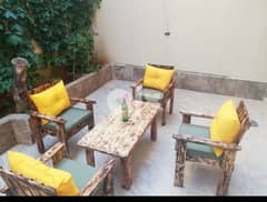 Wood chairs and table for garden