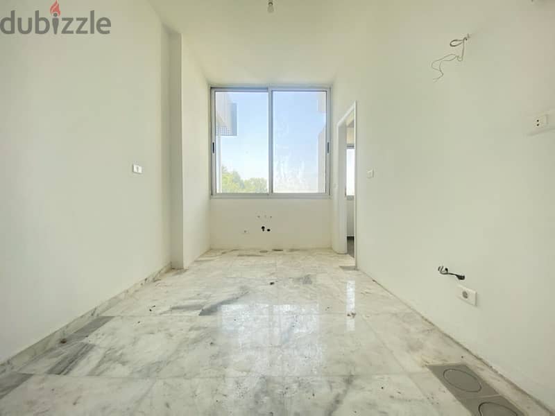 A 130 sqm apartment for sale in Jal el Dib, open greenery views 1