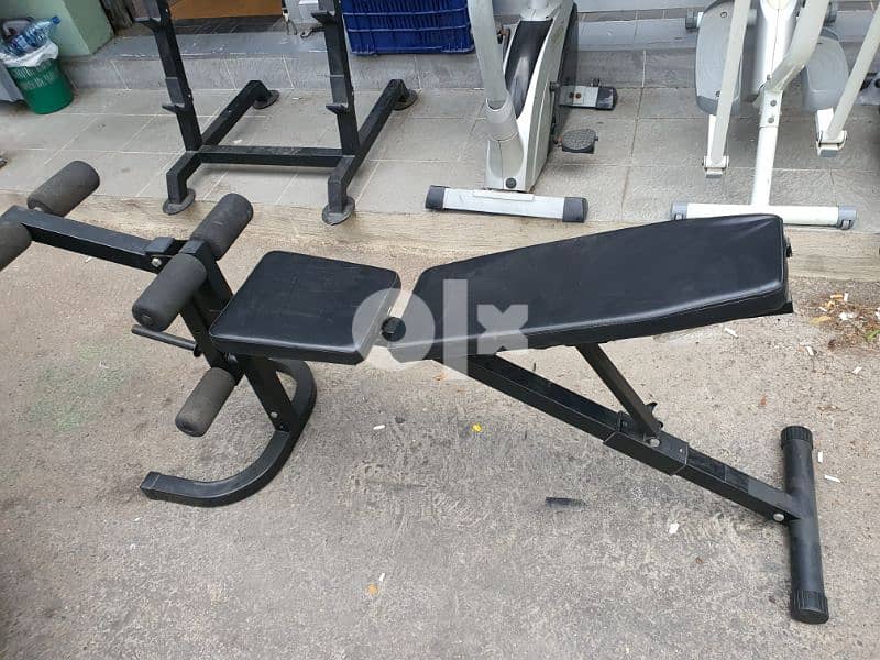 Adjustable bench with wlegs like new only for 100 dollar 03027072 0