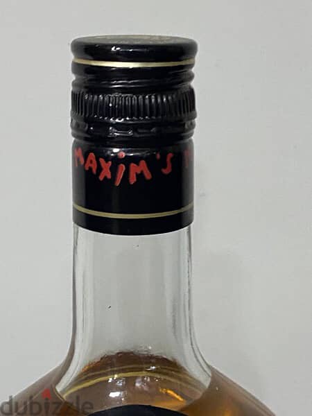 rare antique 1977 discontinued bottle of Maxim de Paris 9
