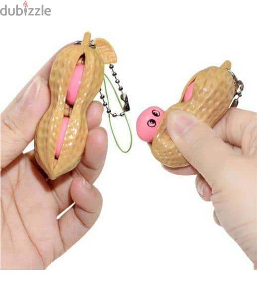 2 in 1 keychain and cute fidget pop out squeeze 3$ 3