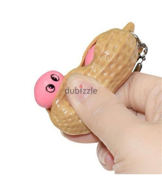 2 in 1 keychain and cute fidget pop out squeeze 3$ 10