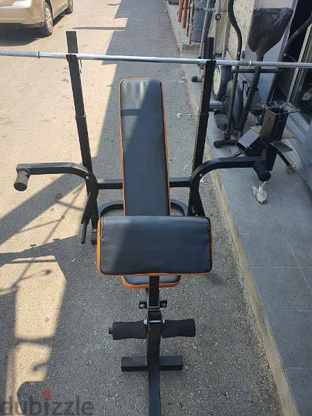 Adustable bench with adjustable rack with biceps stand flies and legs 1