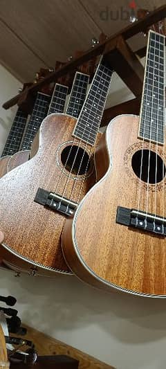 ukulele high quality 23" starting price 65$ with bag and pick free
