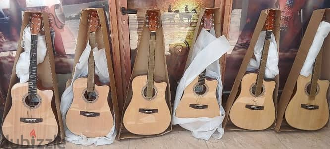 acoustic guitar new in box 4/4