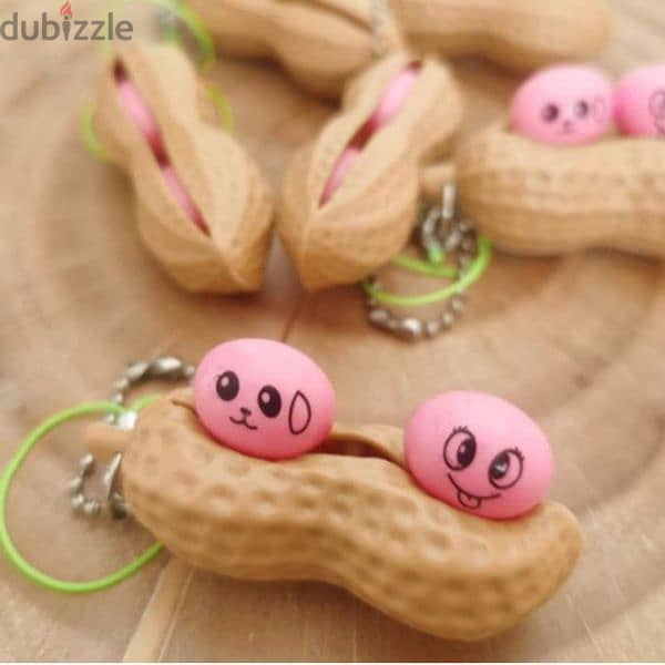 2 in 1 keychain and cute fidget pop out squeeze 3$ 0