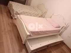 2 beds with integrated extra bed drawer