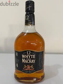 rare antique bottle of white and McKay