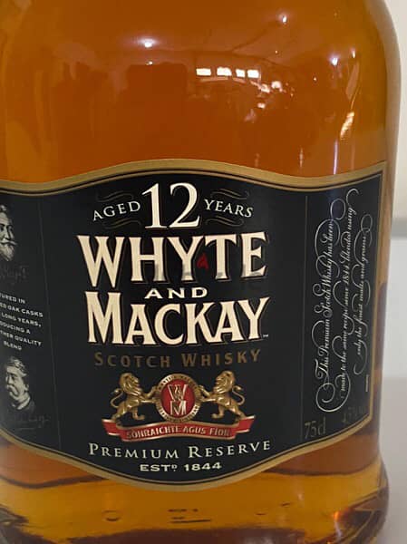 rare antique bottle of white and McKay 2