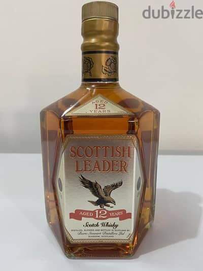 rare antique bottle of scotich leader