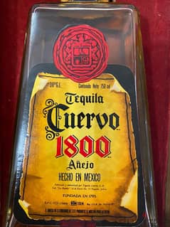 antique Cuervo 1800 Anejo bottle 0
