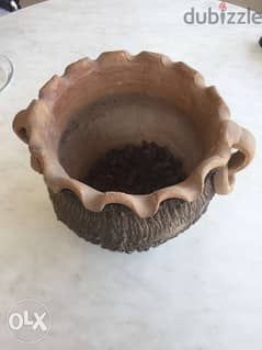 Cache pot en poterie