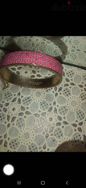 bracelet copy Coach bracrelet pink 1=5$ or 3= 13$