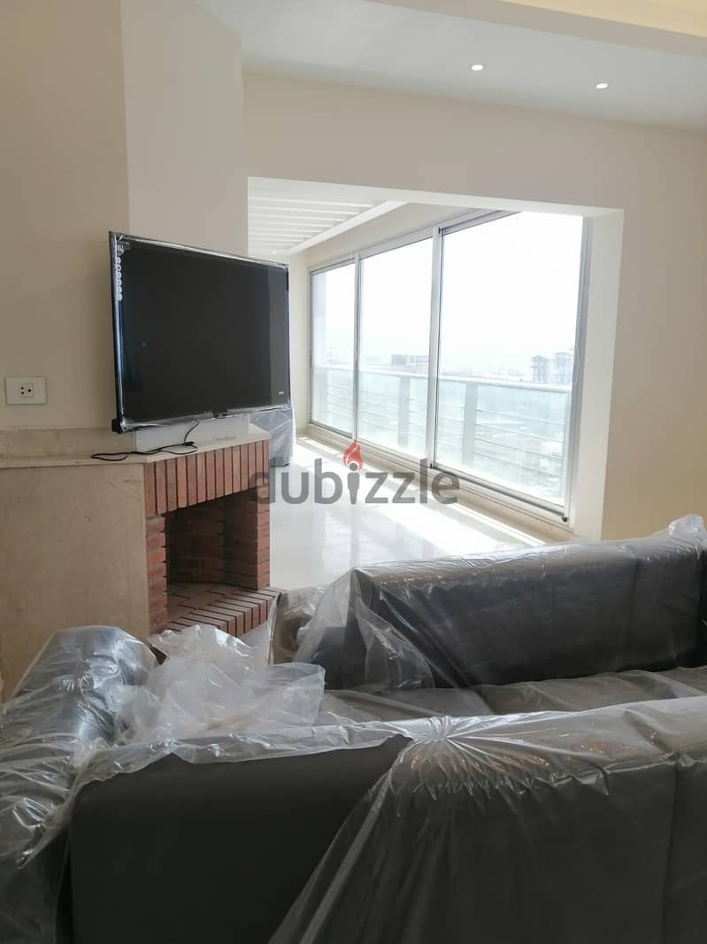 A furnished 350 m2 apartment + sea view for sale in Sahel Aalma 2