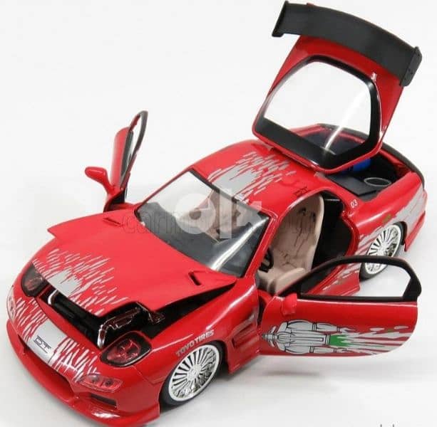 Mazda RX-7 (Fast and Furious) diecast car model 1:24. 3