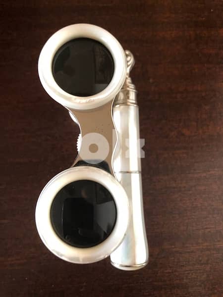 Mother of pearl opera glasses . 6