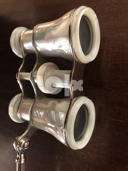 Mother of pearl opera glasses . 9