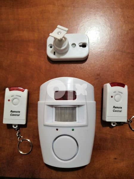 Security Alarm motion sensor 2 remotes 1