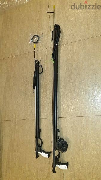 freedive  60 cm 85 $   and 90 cm 100 $ stainless , sharkfin shaft . 1