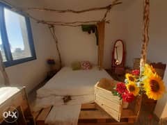 Creative natural bedroom bed with tree branch تخت طبالي مع خشب شجر 0
