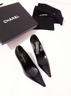 Authentic Chanel black leather pumps